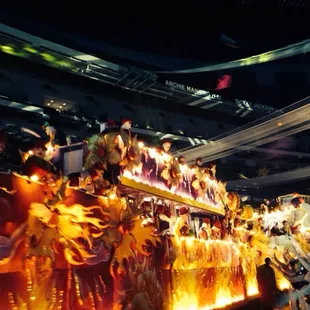 a crowd of people on a float
