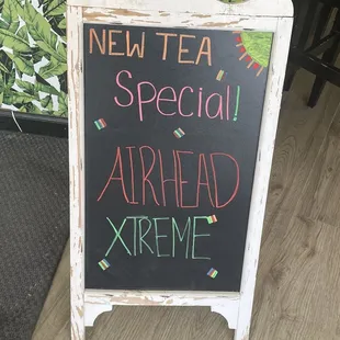 a sign for a new tea special