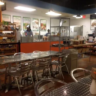 Serving line and interior (partial view of seating in foreground)