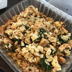 a bowl of scrambled tofu and spinach