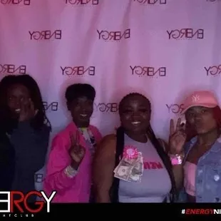 a group of women posing for a picture