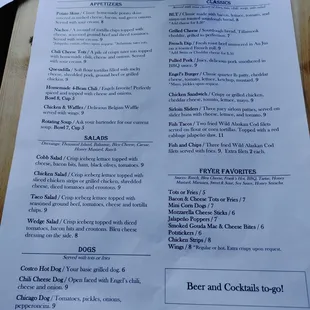 a menu on a wooden table