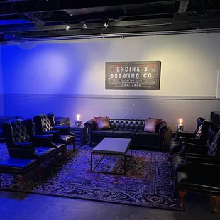 a living room with blue lighting