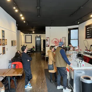 a group of people in a coffee shop