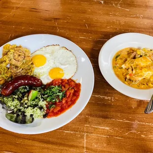 Patacon Con Huevo y Chorizo (Left) and Cajun Shrimp and Polenta (Right)