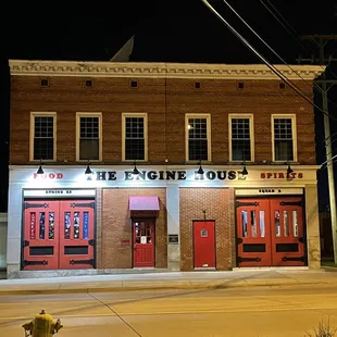 The front of the restaurant at night.
