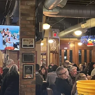 a large group of people in a restaurant