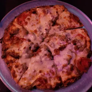 Small pepperoni, sausage and bacon pizza.