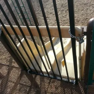 Broken slides locked and gated off.