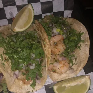 two tacos on a checkered plate