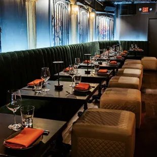 a long table with place settings and place settings