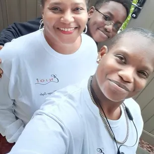 a group of people posing for a selfie