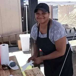 a woman preparing food
