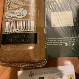 a jar of coffee on a table