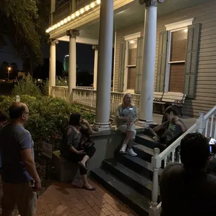 Susan giving history on one of the homes in Heritage Park.