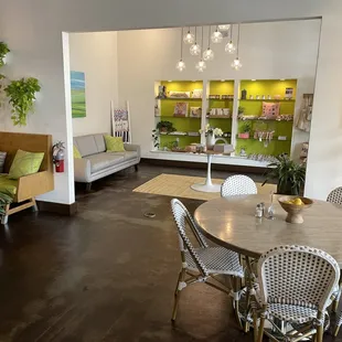 a living room with a dining table