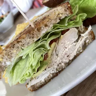 a chicken sandwich with lettuce