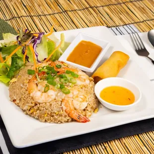 Lunch Special fried rice with Shrimp. Served with salad and egg roll.