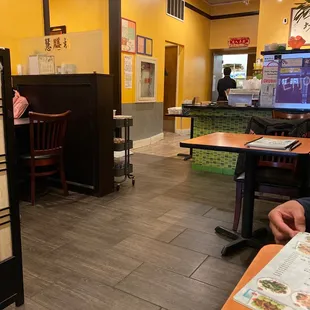 a woman sitting at a table