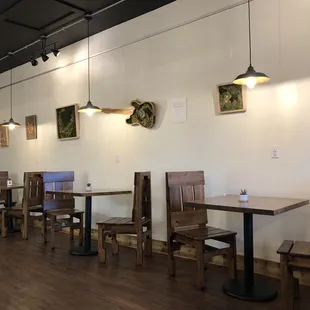 Heavy duty tables and chairs! Love the living greenery throughout!