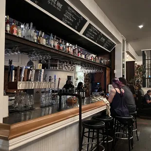 people sitting at the bar