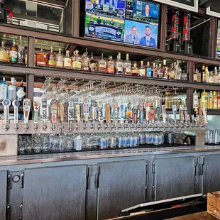 a bar with a variety of liquors