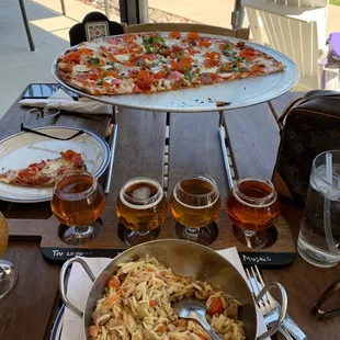 Orzo pasta $13. 16" Large pizza $17.50 +$3 sausage +$1.50 basil. Beer $7 + Beer Flight $12 = Delicious!