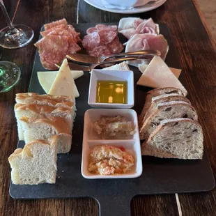 A cheese board for 2 and the Olives appetizer