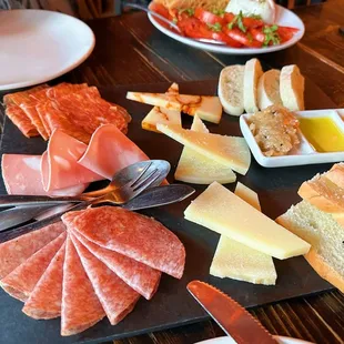 Piccolo  3 meats, 3 cheeses and accompaniments. Served with bread