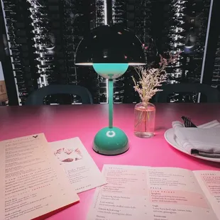 table, menus, and wine cellar