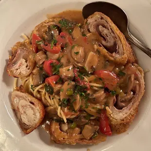 $19 | Stuffed Pork Cutlet - stuffed & rolled w/ prosciutto & mozz. cheese, in a brandy wine sauce w/ roasted peppers & mushrooms.