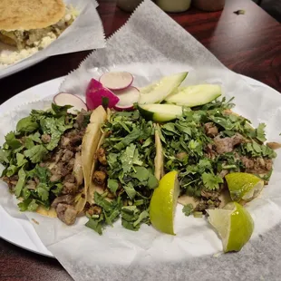 3 Tacos.  Barbacoa, al pastor, steak