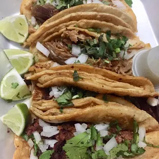 Two carnitas ($2/ea) and two chorizo ($2.85/ea) tacos...w/salsa verde
