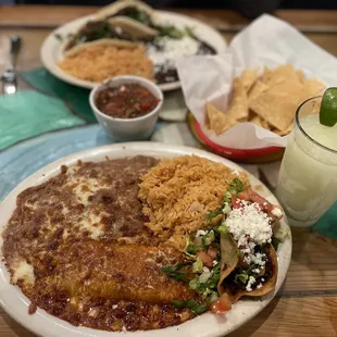 Veggie taco/enchilada combo plate, like marg, and carne tacos.