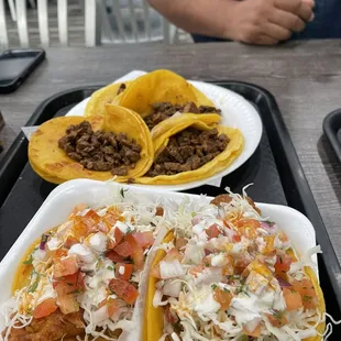 Plain carne asada tacos and fish tacos.