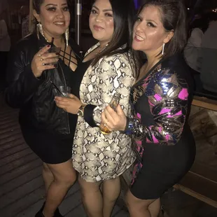 three women posing for a picture