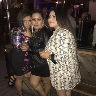 three women posing for a picture