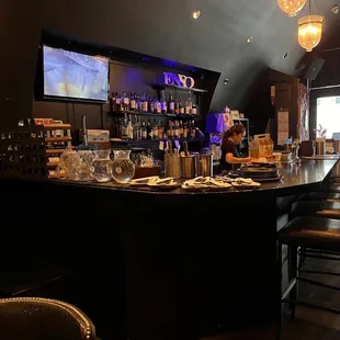 a bar with a large screen