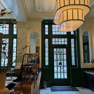 a view of a dining room with a chandelier