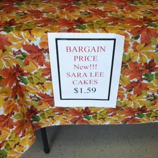 a table with a sign on it