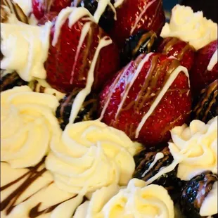 Lucious White Cake W/Buttercream Frosting-Filling + Strawberry Filling and Garnished with a Medley of Fresh Fruit!