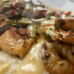 Seafood grits with gouda cheese
