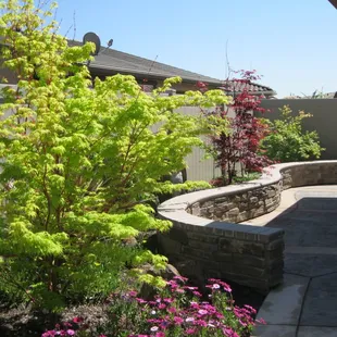  garden with a stone retaining wall