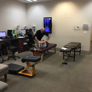 Dr Kwazman adjusting