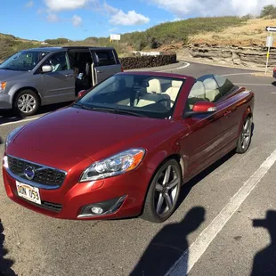 Driving around the island. Top down, enjoying the views in our beautiful Volvo C70.