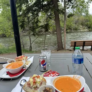 Half sandwich and soup- Italian Sub and Tomato Basil Soup.