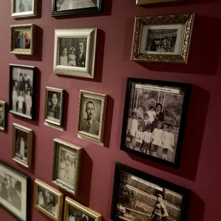 a wall of family photos
