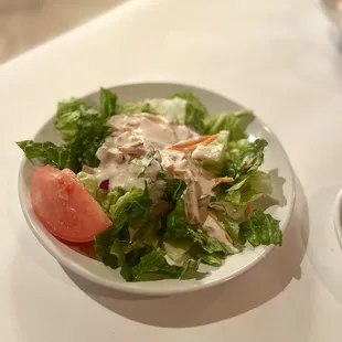 Side salad with creamy Italian dressing.