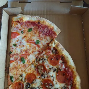 Margarita Slice, Pepperoni mushroom slice and water/pop for $13. Huge slices!