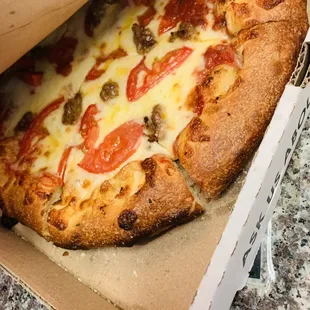 Overcooked pizza that&apos;s been sitting while waiting for my breadsticks
